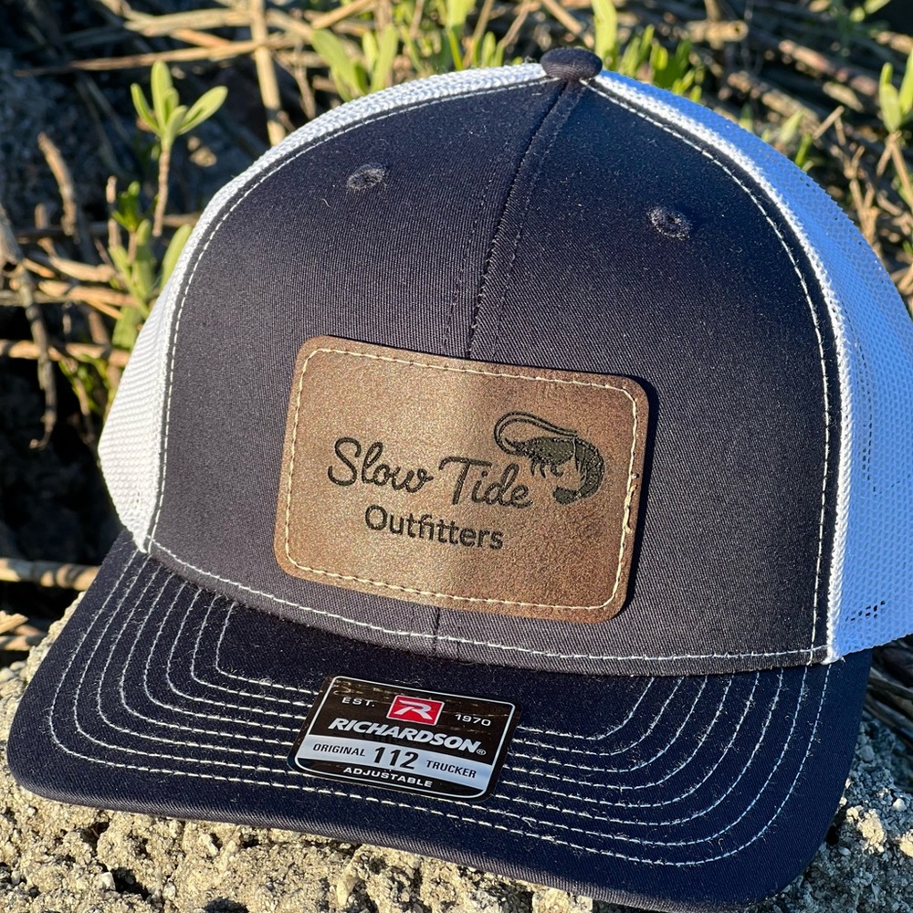 “Slow tide Outfitters” Trucker Hat
